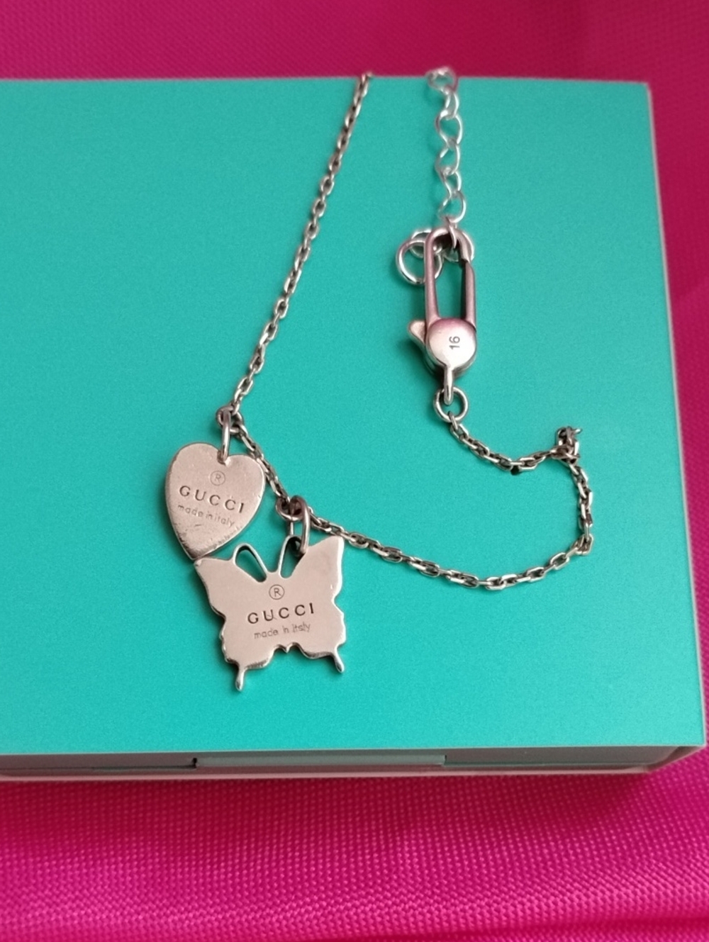 Gucci Silver Heart and Butterfly Charm Bracelet.